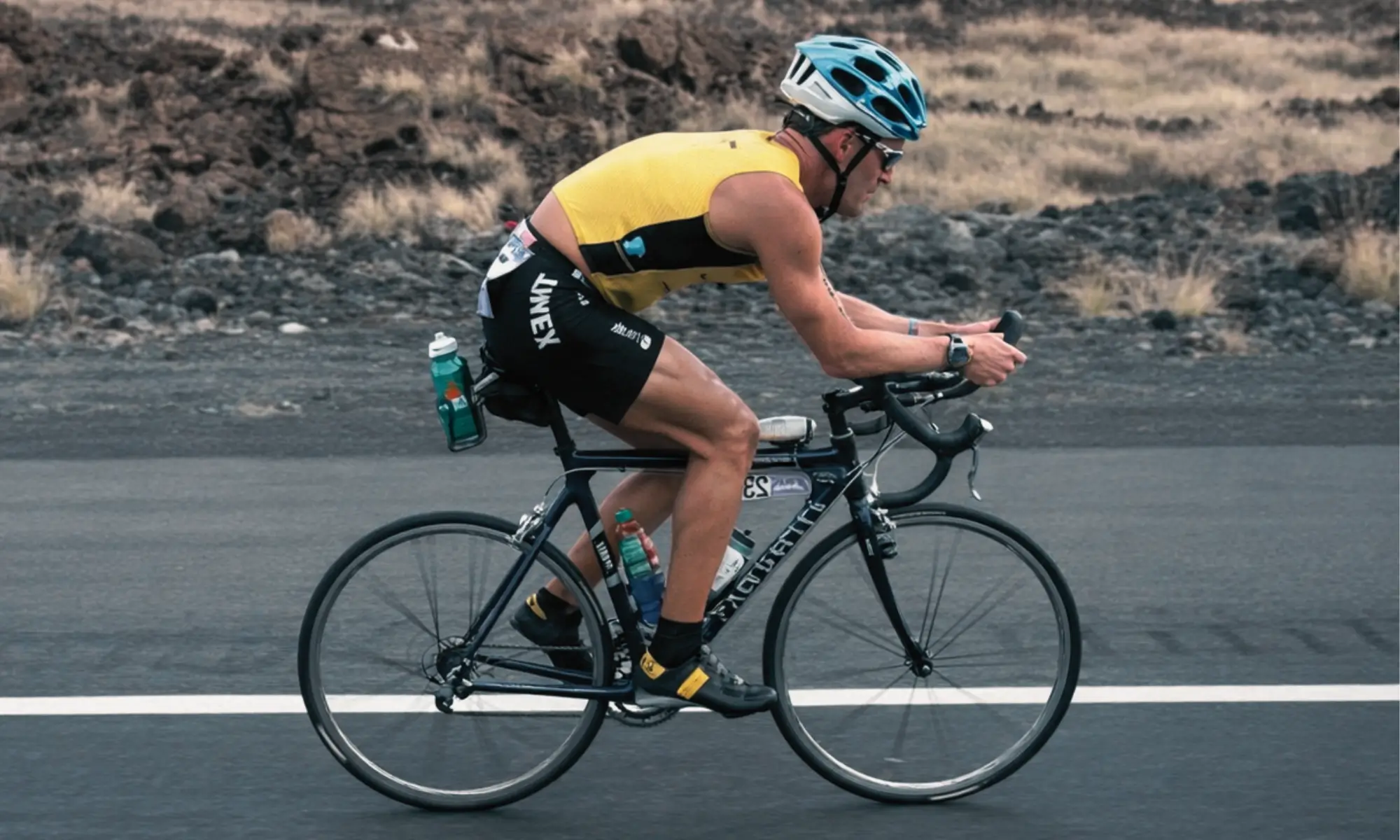 Person riding a road bicycle during an outdoor cycling event